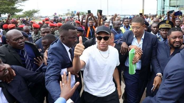 WATCH: Kylian Mbappe has serious security detail in Cameroon as he puts PSG chaos aside to enjoy kickabout with kids-Sat, 08 Jul 2023 21:48:34 GMT
